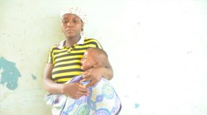 A Shikira mother holding her sick child, affected by the lead poisoning incident - Source - Global Rights Nigeria